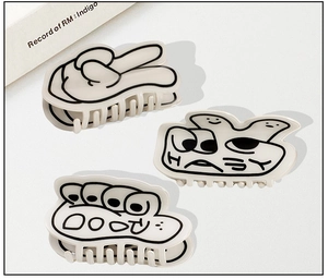 Dettagli di fermagli per capelli in acrilico con forme creative e design graffiti cartoon