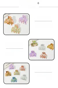 Détail de pinces à cheveux à motifs marbrés dans les tons violet, orange et vert
