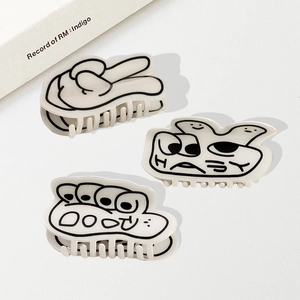 Set di 3 mollette per capelli in acrilico con gesti creativi e grafiche lineari