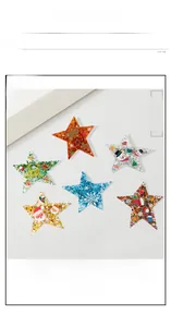 Set of acrylic star-shaped hair clips with festive Christmas sequins and glitter