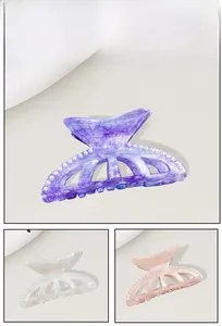 Detailed views of ocean-themed acrylic shark hair clips with pearl accents in three colors