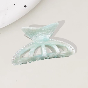 Mint green mermaid tail hair claw clip with glitter finish and pearl trim accents