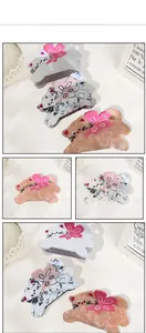 Détails des pinces à cheveux chat en acétate avec de jolis nœuds papillon roses