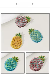 Detailed view of acetate pineapple hair claws with crystal rhinestones in vibrant colors