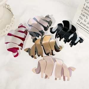 Minimalist acetate hair claw clips in five colors with wavy design for thick hair styling