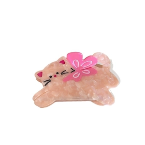 Pince à cheveux chat rose marbré avec nœud rose vif pour coiffures féminines