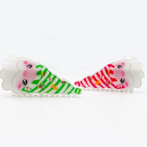 Set di pinze per capelli natalizie in acrilico con design a righe e cappello di Babbo Natale