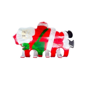 Festive Santa Claus hair claw clip in classic red and white colors on a plain background