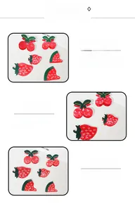 Detailed view of handmade cherry strawberry and watermelon hair clips in vibrant resin