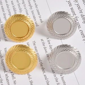 Macro detail of gold and silver rope textured bezel settings for DIY jewelry making