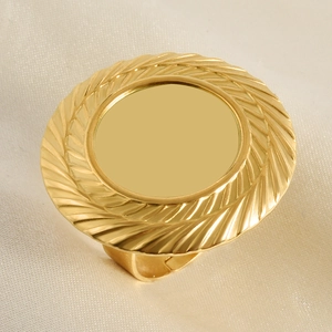 Detailed macro view of the golden textured surface of the stainless steel ring
