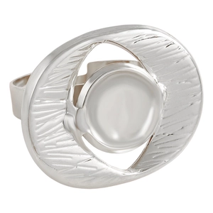 Macro detail of silver hollow ring with hammered texture and white round bead inlay