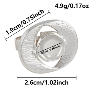 Detail view of irregular silver oval ring showing brushed texture and 4.9g weight specs