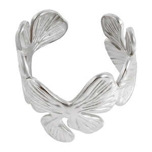 Detail shot of silver butterfly leaf open ring showing brushed metal texture and craft