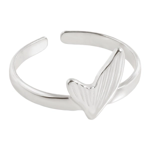 Macro shot of a minimalist silver fishtail ring with engraved texture and open design