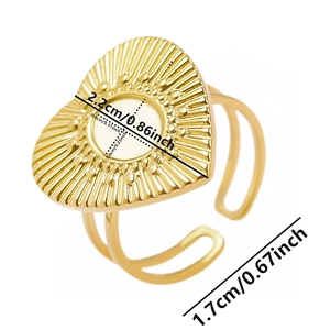 Macro detail of heart-shaped ring base with sunburst texture and dimension markers