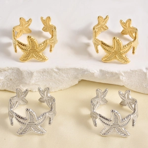 Adjustable starfish open rings set in gold and silver finish with detailed ocean sea theme