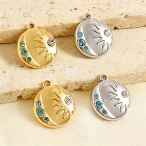 Polished stainless steel sun and moon pendants with diamonds in gold and silver plating