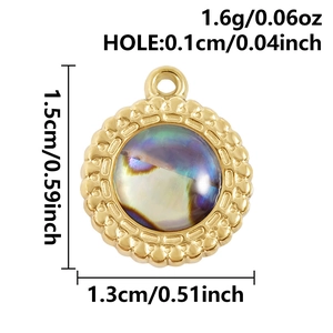 Detail of 18k gold plated stainless steel round pendant with natural shell and wave texture