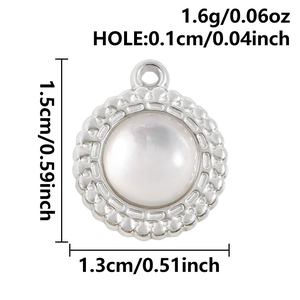 Detail view of round silver pendant with white pearl inlay and size measurements