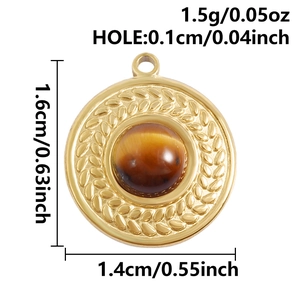 Close-up of 18k gold plated round pendant with tiger eye stone and wheat ear engraving