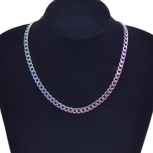 Rainbow plated stainless steel Cuban link necklace for men on black neck model display