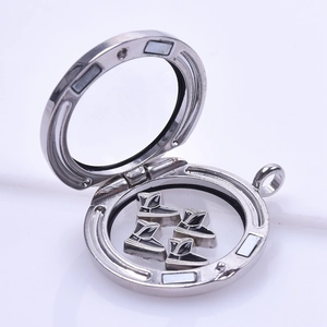 Floating charms locket in silver stainless steel with black boot charms inside