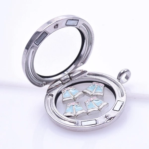 Silver floating charms locket with bells charms inside glass window pendant