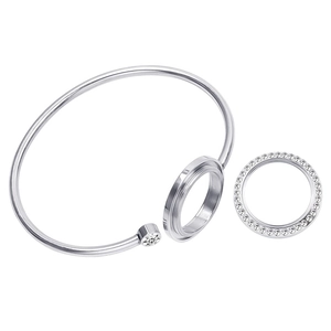 Close-up of 25mm silver stainless steel glass locket bracelet with shiny crystals