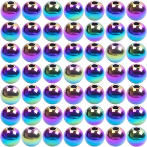Macro view of rainbow plated stainless steel spacer beads arranged in a precise grid
