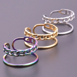 Close-up of double-layer open rings in rainbow, gold, and silver Cuban link styles