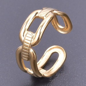 Macro detail of golden chain link adjustable ring with textured stripe engravings