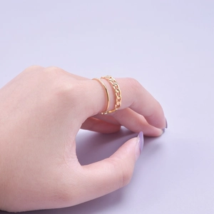 Minimalist double-layer gold plated ring with Cuban chain and slim band on purple backdrop