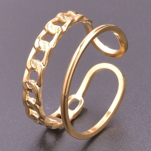 Macro shot of gold double-layer open ring featuring chain texture and polished minimalist band