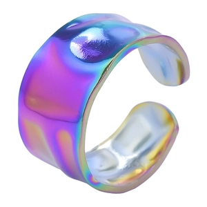 Macro detail of rainbow stainless steel ring with hammered texture and adjustable open band