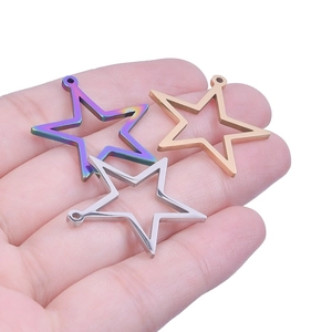 Polished hollow star pendants in gold, rose gold, and rainbow finishes for DIY jewelry