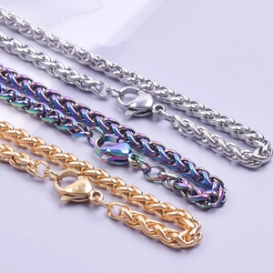 Detail of 3mm stainless steel dragon bone chains in silver, gold, and rainbow colors