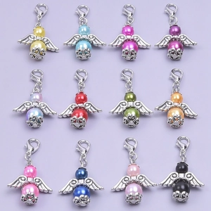 Set of 12 colorful angel wing charms with pearls and lobster clasps for party favors