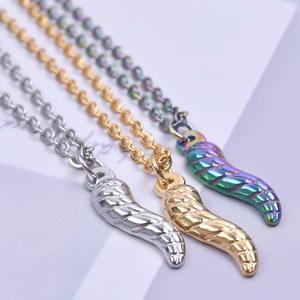 Three 18K stainless steel feather pendant necklaces in gold, silver, and rainbow colors