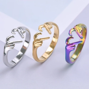 Minimalist hand-shaped stainless steel rings in silver, gold, and rainbow finishes