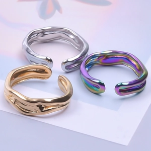 Three-piece set of minimalist wavy open rings in gold silver and iridescent colors