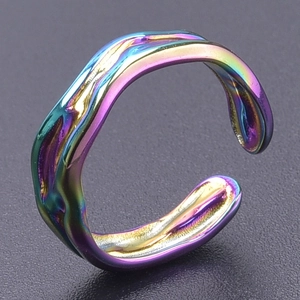 Macro shot of liquid lava style adjustable ring with iridescent metallic gradient finish