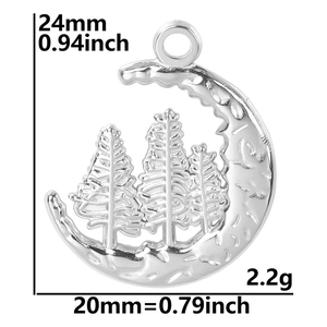 Detailed view of silver crescent moon and pine forest pendant with dimensions 24x20mm