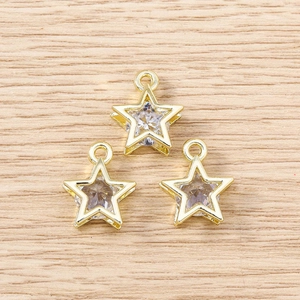 Set of three gold star charms with clear faceted crystals for DIY jewelry making