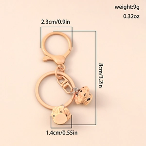 Detailed view of cupcake keychain size and weight parameters with metal lobster clasp