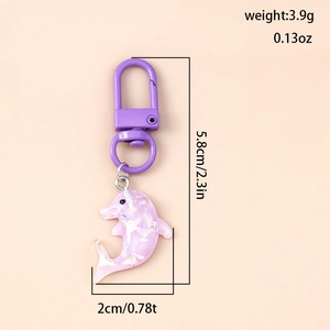 Porte-clés dauphin rose à paillettes avec anneau violet et dimensions de l'accessoire