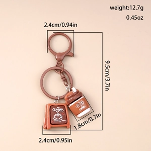 Detail of coffee theme keychain showing dimensions 9.5cm length and weight 12.7g