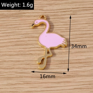 Detailed view of pink flamingo charm dimensions 34mm by 16mm for DIY jewelry making