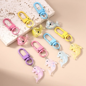 Porte-clés dauphin minimalistes en résine avec paillettes irisées multicolores