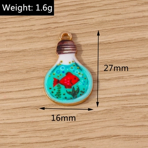 Macro view showing 27x16mm bulb-shaped gold alloy fish pendant with red fish and blue water